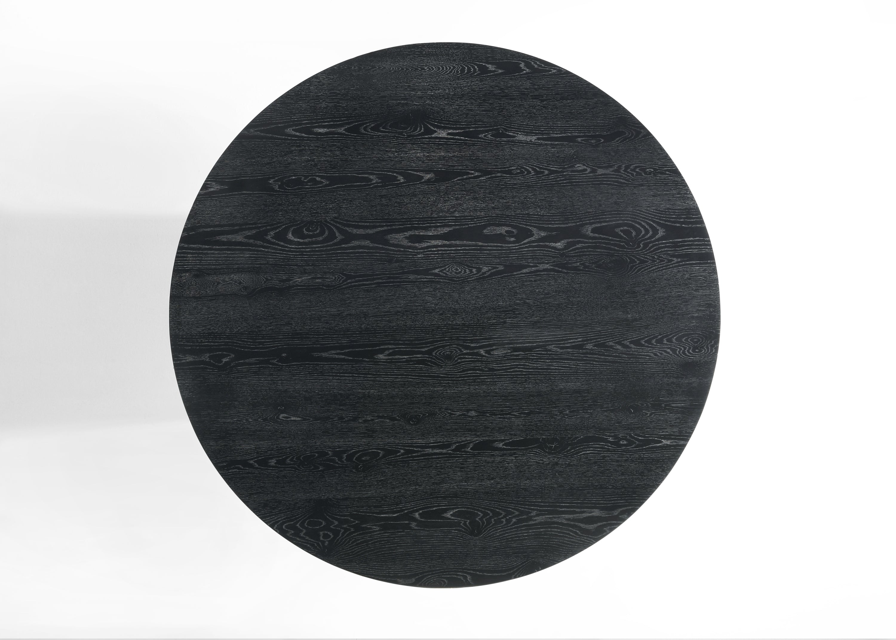 Top view of Jasper Dining Set - Black Round Table. Displays circular wood grain pattern and smooth matte finish.