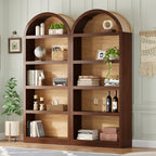 Two farmhouse arched bookshelves in walnut and natural wood with five open tiers and fabric-lined top detailing.