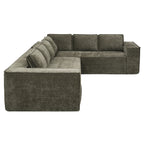 Side view of the chenille modular sectional sofa showing its deep seating and plush cushions in a dark green tone.