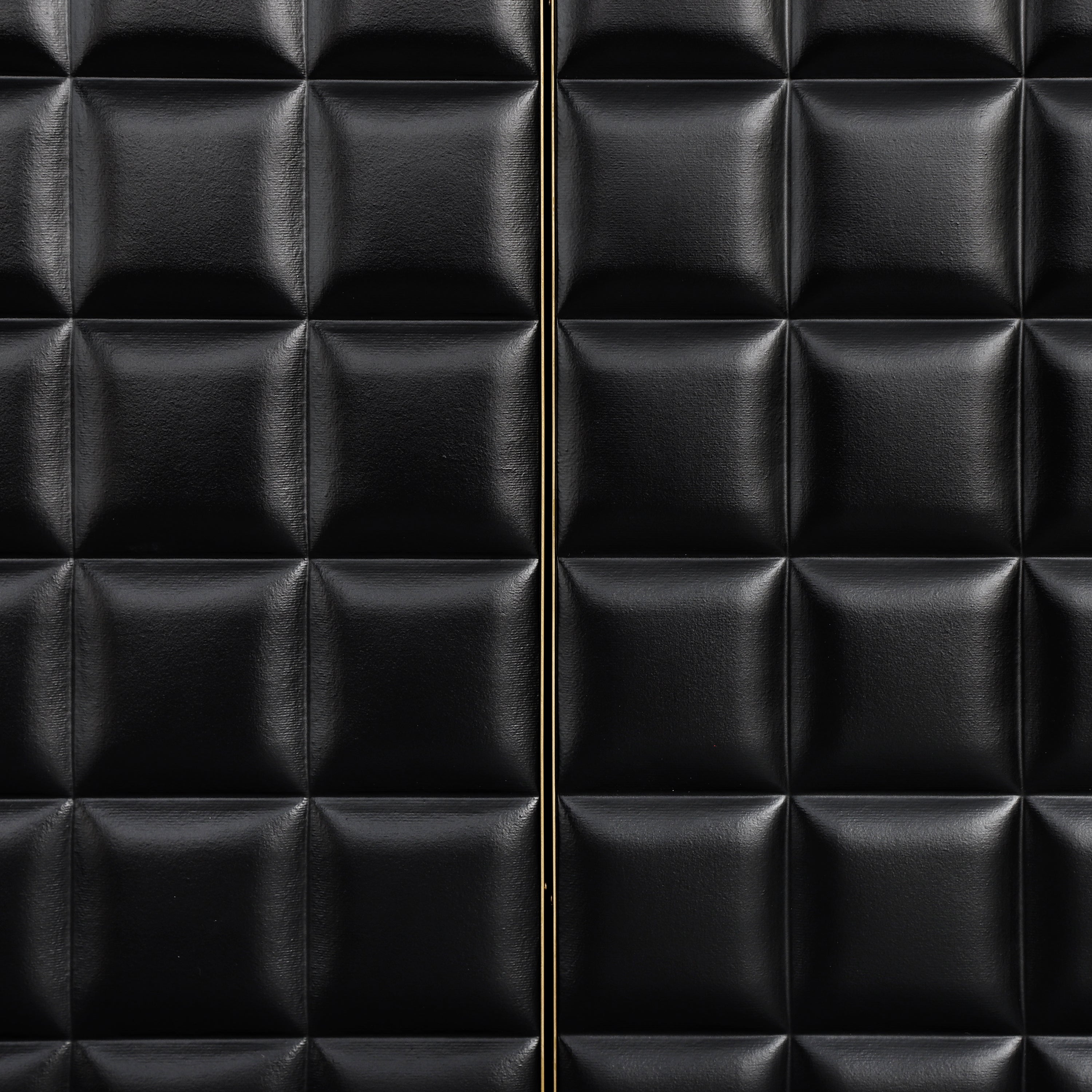 Close-up of geometric door design on 4-Door Storage Cabinet featuring black padded panels and gold metal trim for a modern look.