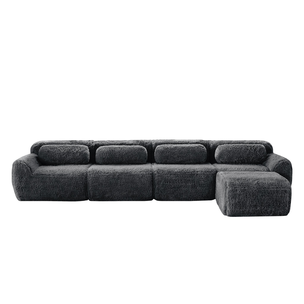 Dark grey sofa - modular sectional plush fabric with no visible seams. Offers setup-free convenience and a modern, cozy look.