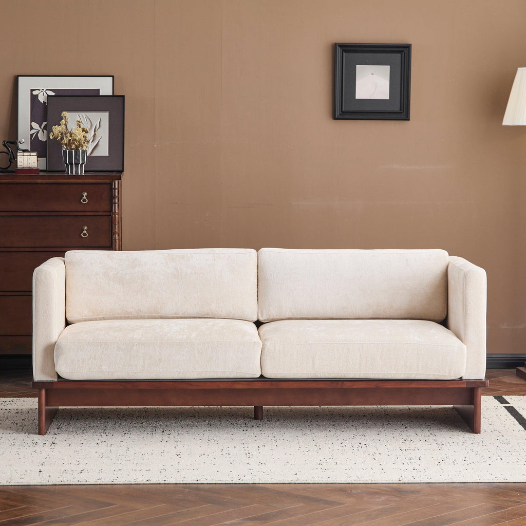 Modern Three-Seater Boucle Sofa - Beige Upholstered Couch.