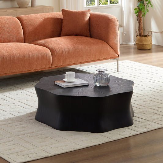 Black petal coffee table, with fiberglass surface covered with birch wood grain veneer in watercolor finish and sprayed with black paint. The sides have a brushed effect. Suitable for living room.