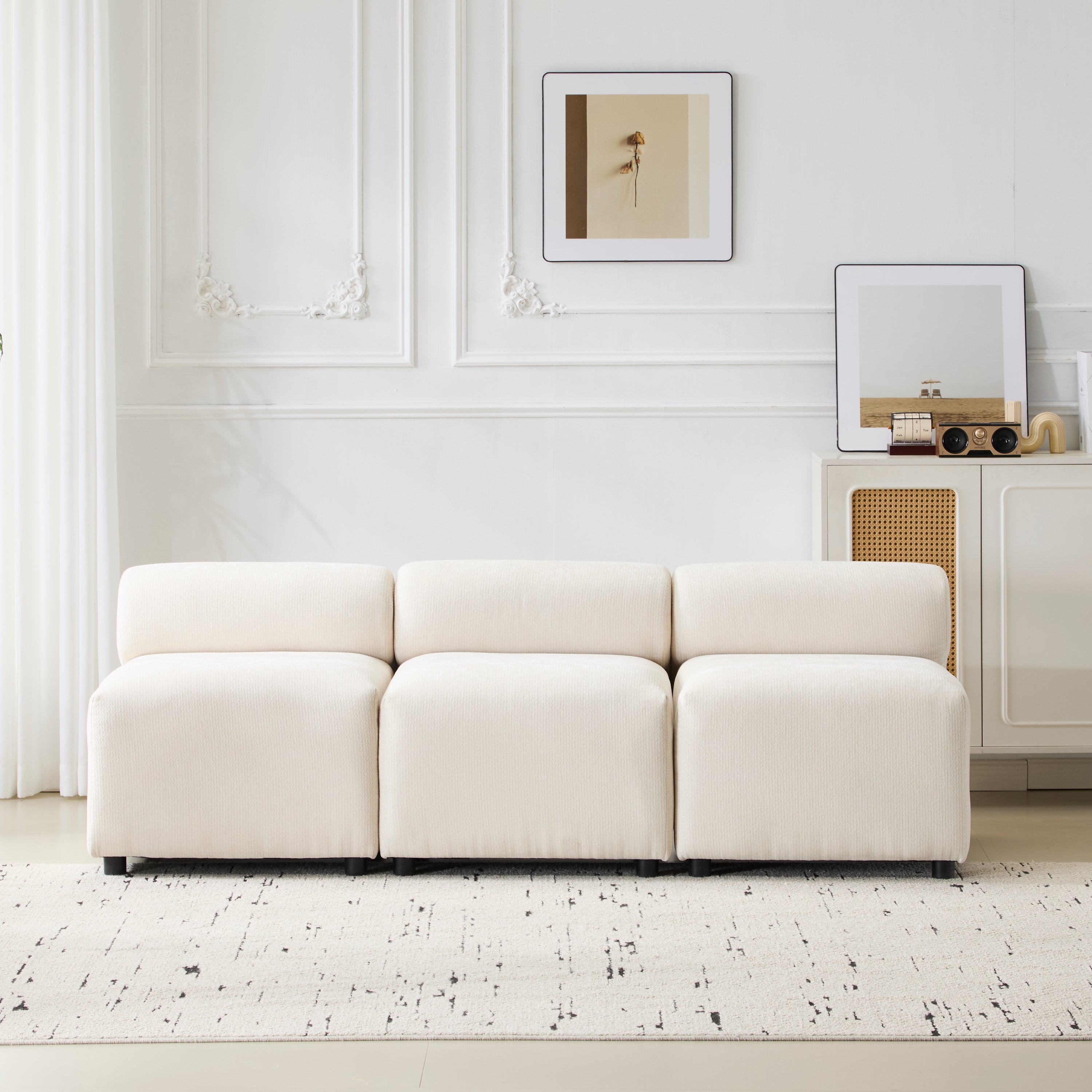 Evelyn 3-piece modular chenille sofa in cream color with armless design, perfect for modern living rooms or office spaces.