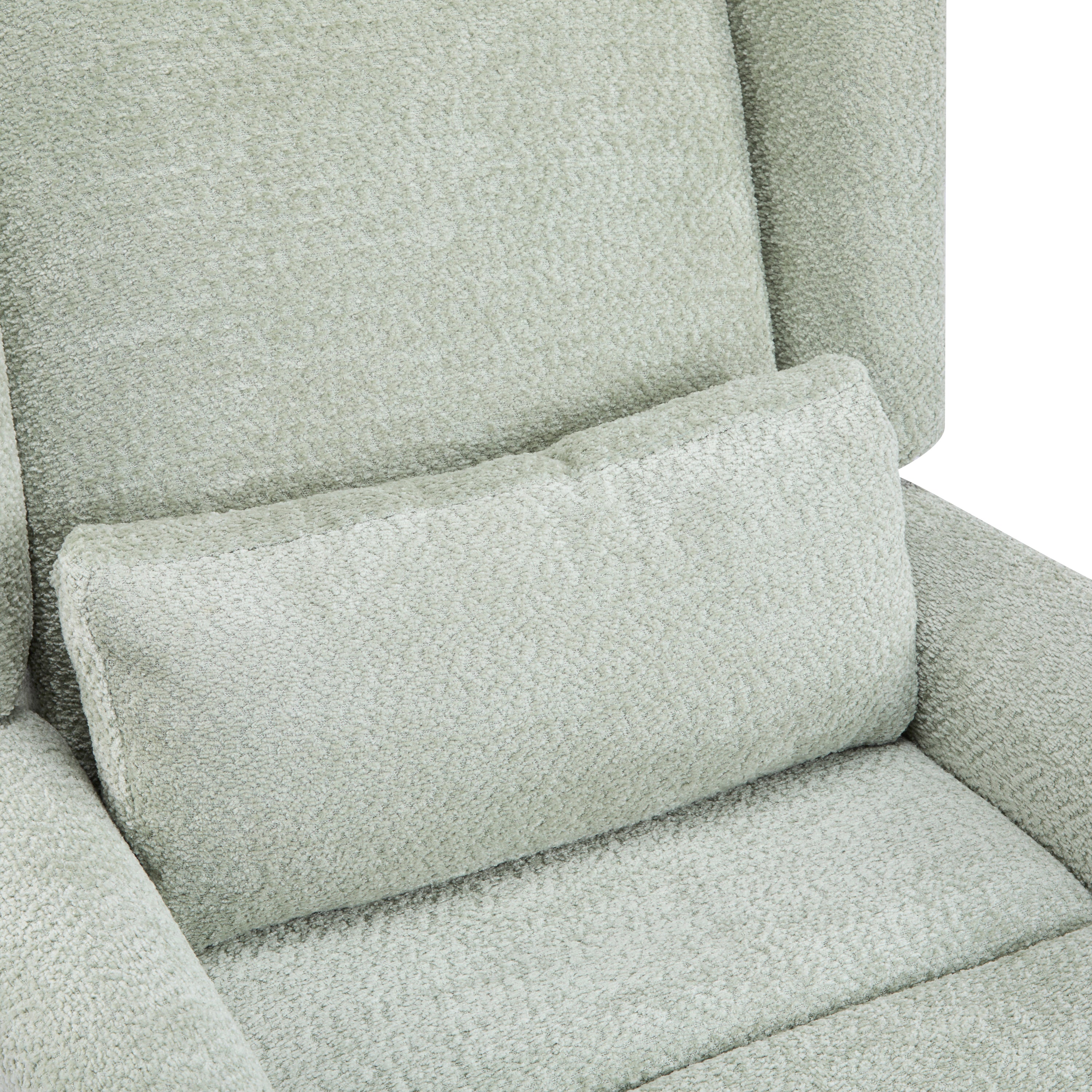 Close-up of lumbar cushion on boucle upholstered swivel recliner chair, emphasizing plush texture and ergonomic support.