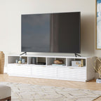 White Coastal Credenza in a living room setting with large TV, offering elegant storage and display for modern home entertainment.