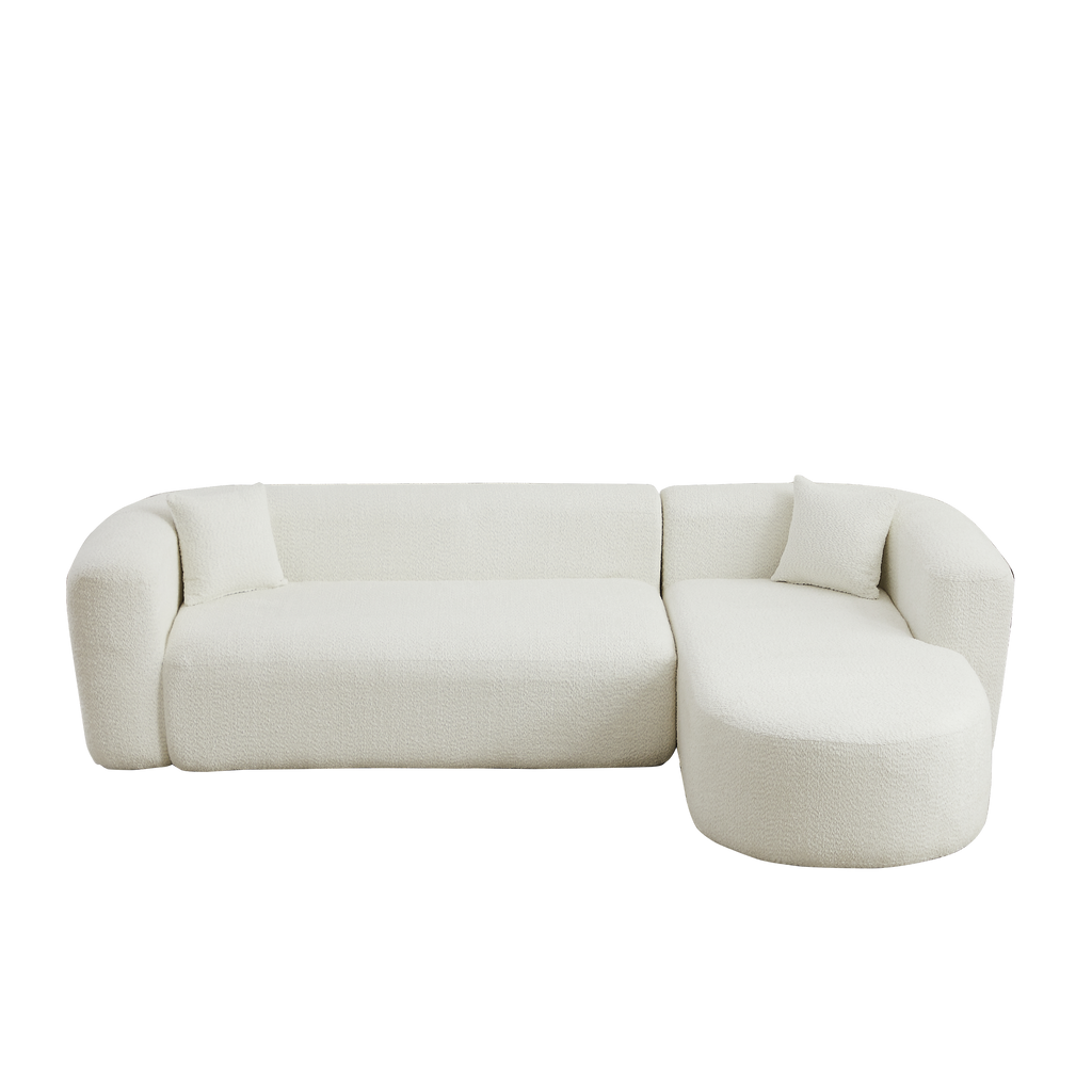 Isolated front angle of beige chenille modular sectional sofa with right-facing chaise, displayed on a black background.