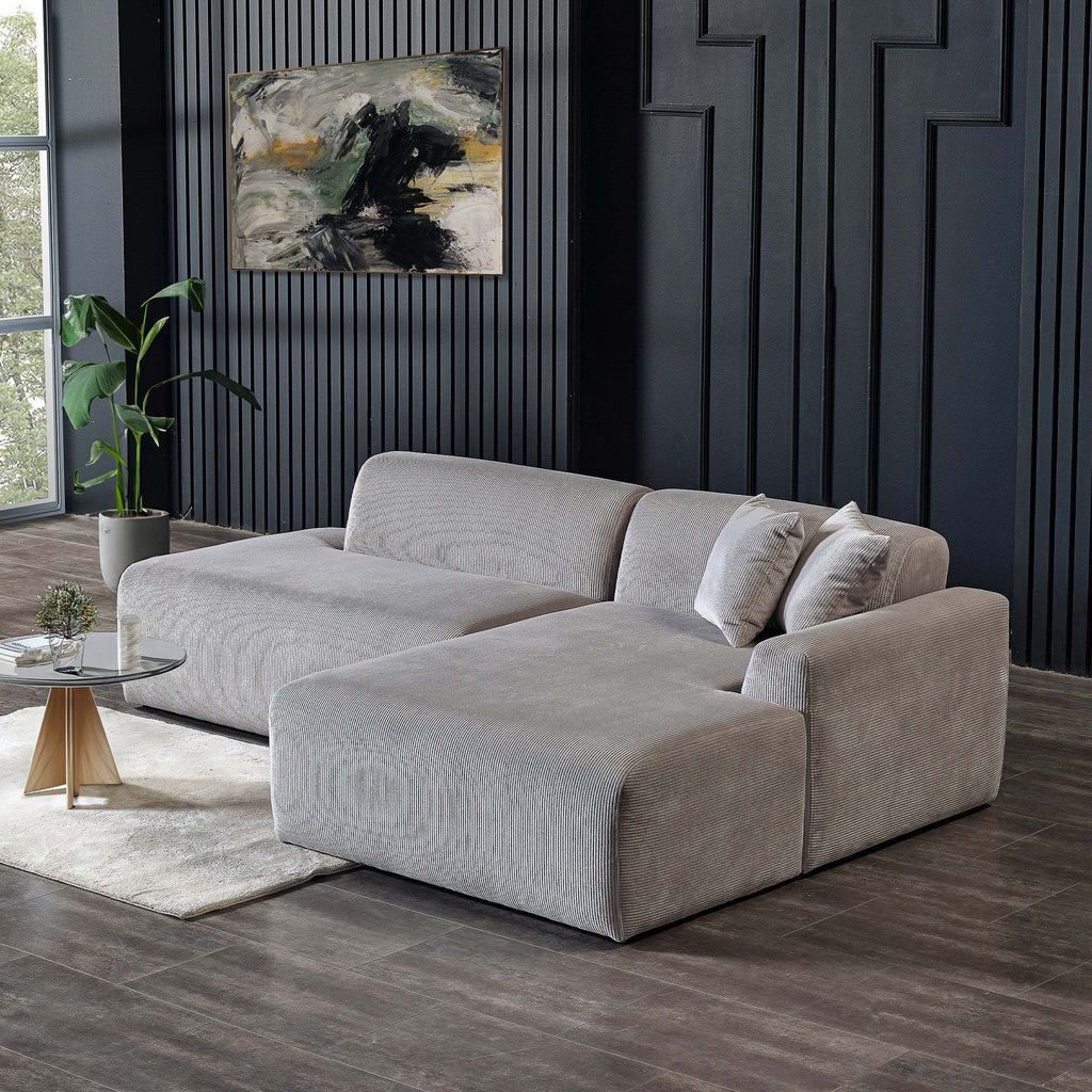 Modern light grey corduroy right-facing sectional sofa with a low-profile, minimalist design.