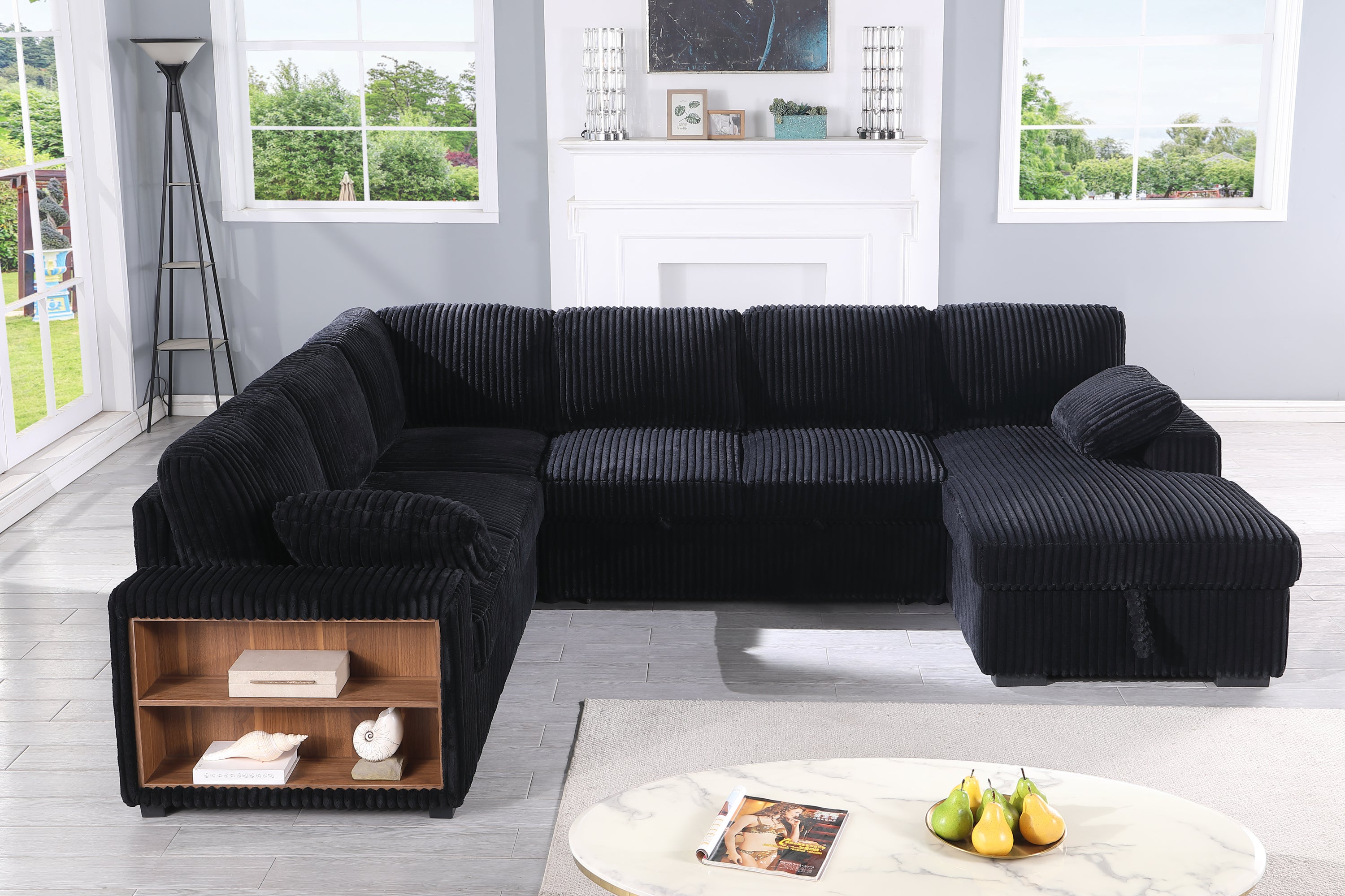 Black corduroy sectional sleeper sofa with hidden storage and open shelf, offering versatile seating and space-saving design.