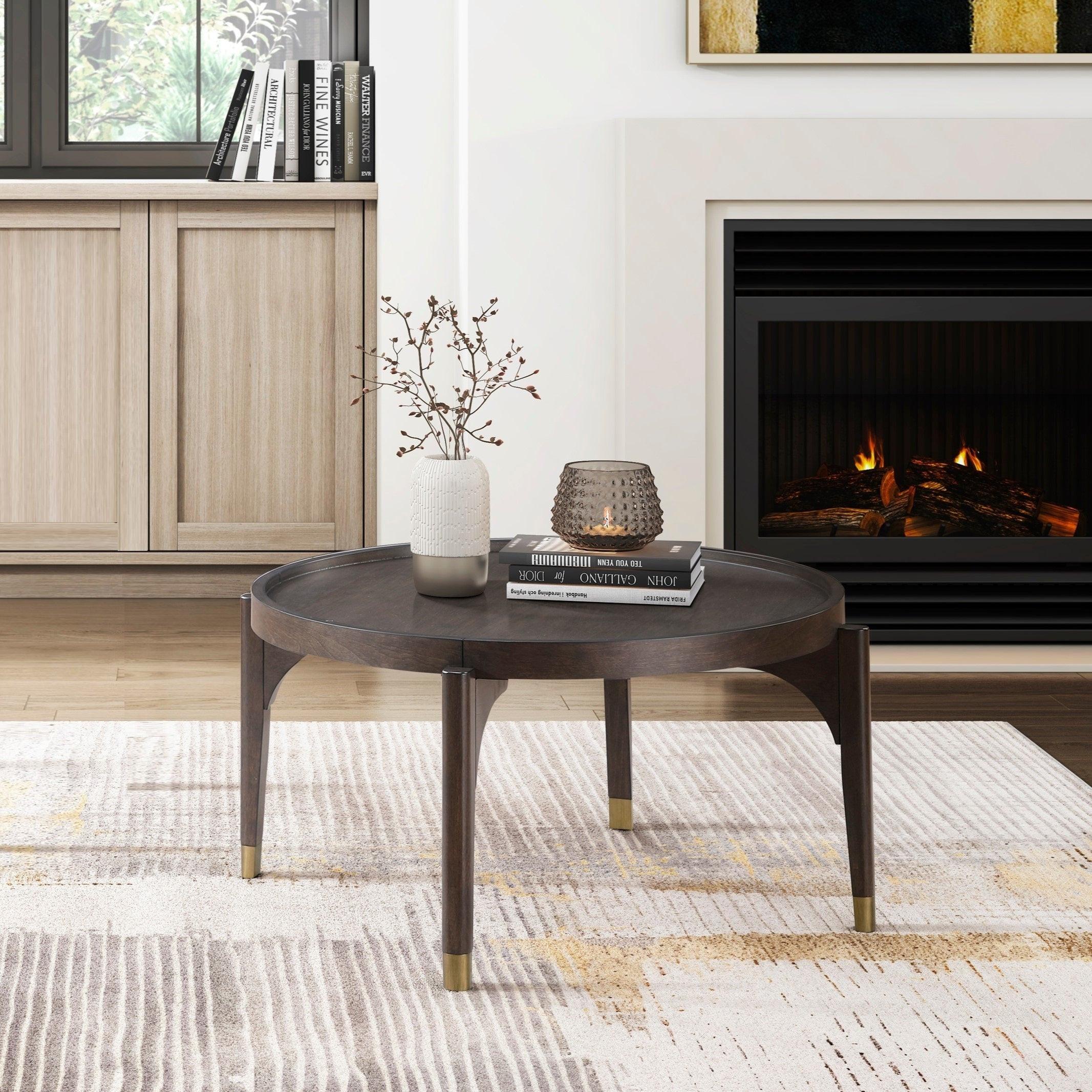 Dark Brown Cocktail Table with Gold Tip Legs.