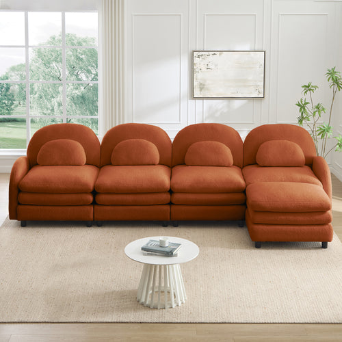 Orange, 4-seat modular teddy fabric sectional with curved backs, lumbar pillows, and a movable ottoman.