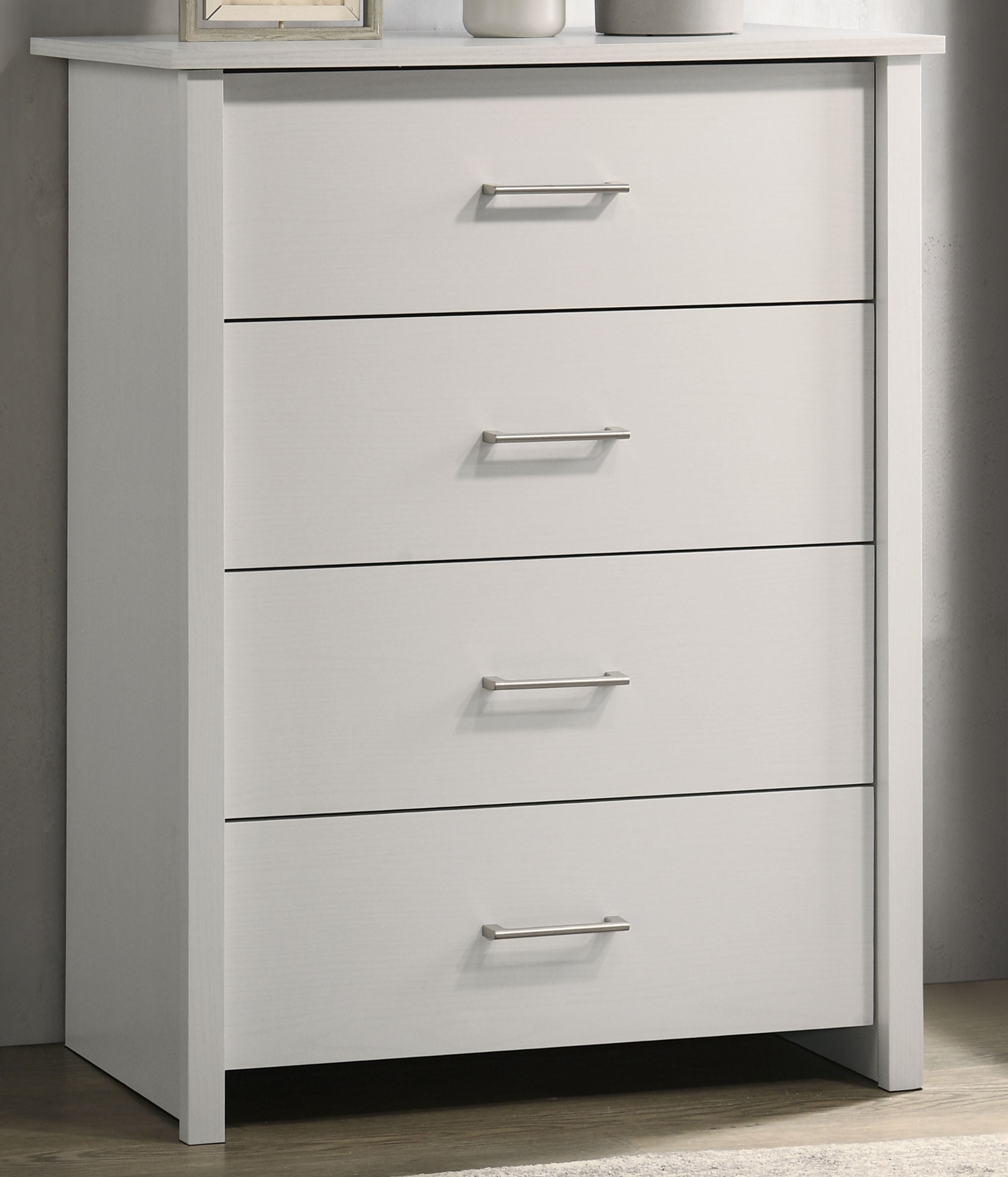 Celeste Chest - White 4-Drawer Chest featuring silver handles and clean lines. Ideal for contemporary bedroom or living space storage.