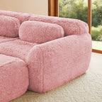 Right side close-up of pink modular plush sofa, featuring soft curves, plush texture, and ergonomic backrest for cozy lounging.