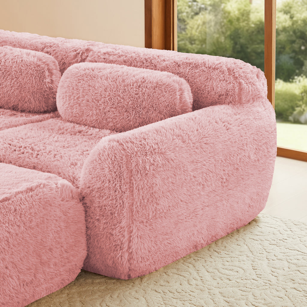 Right side close-up of modular pink sofa chaise with plush fabric and ergonomic backrest, ideal for modern cozy interiors.