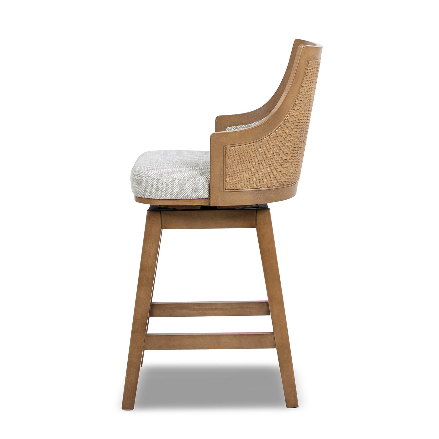 Side view of Bahama 26' Rattan Swivel Counter Stool with cane paneling and cushioned seat in gray polyester wool blend for stylish bar seating.