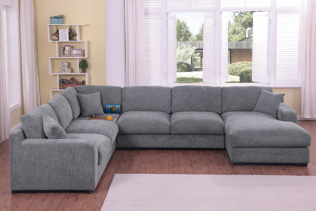 Modern light gray chenille sectional with chaise and built-in charging ports. Spacious 5-seater sofa ideal for contemporary living rooms.