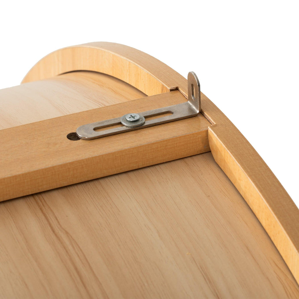 Top safety bracket on arched kitchen pantry cabinet for secure wall mounting and added stability in kitchen spaces.
