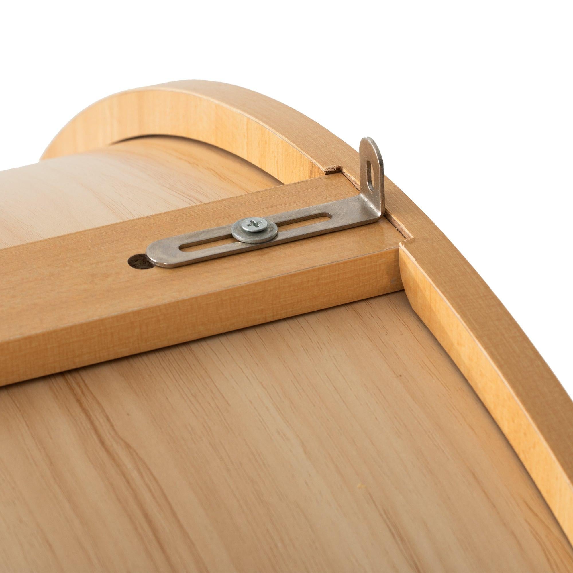 Top safety bracket on arched kitchen pantry cabinet for secure wall mounting and added stability in kitchen spaces.