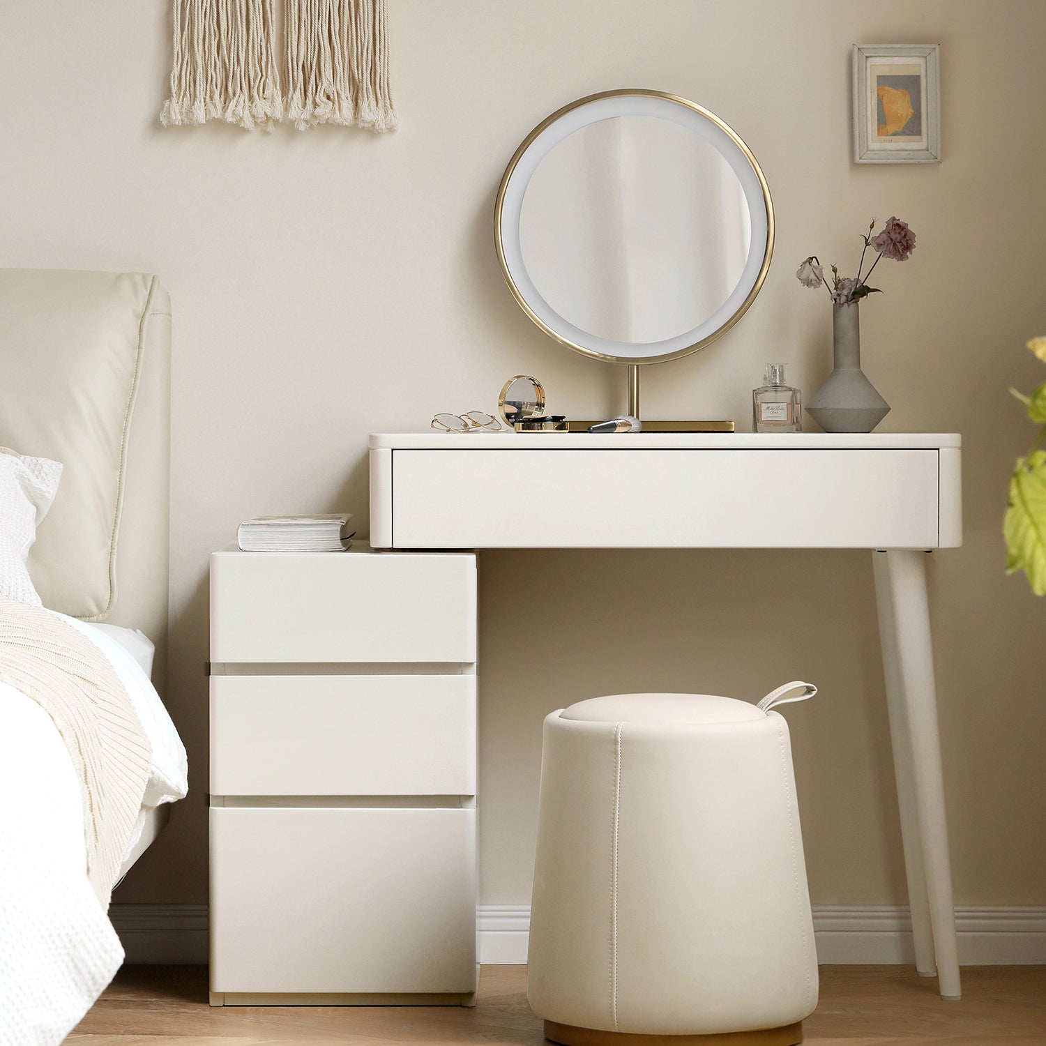 White Solid Wood Dresser Table - Liriodendron Design styled in a bedroom with matching stool, round mirror, and decorative accessories.