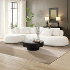 Beige Oversized L-Shape Sectional Sofa with Chaise styled in a contemporary room with dark accents and natural lighting.