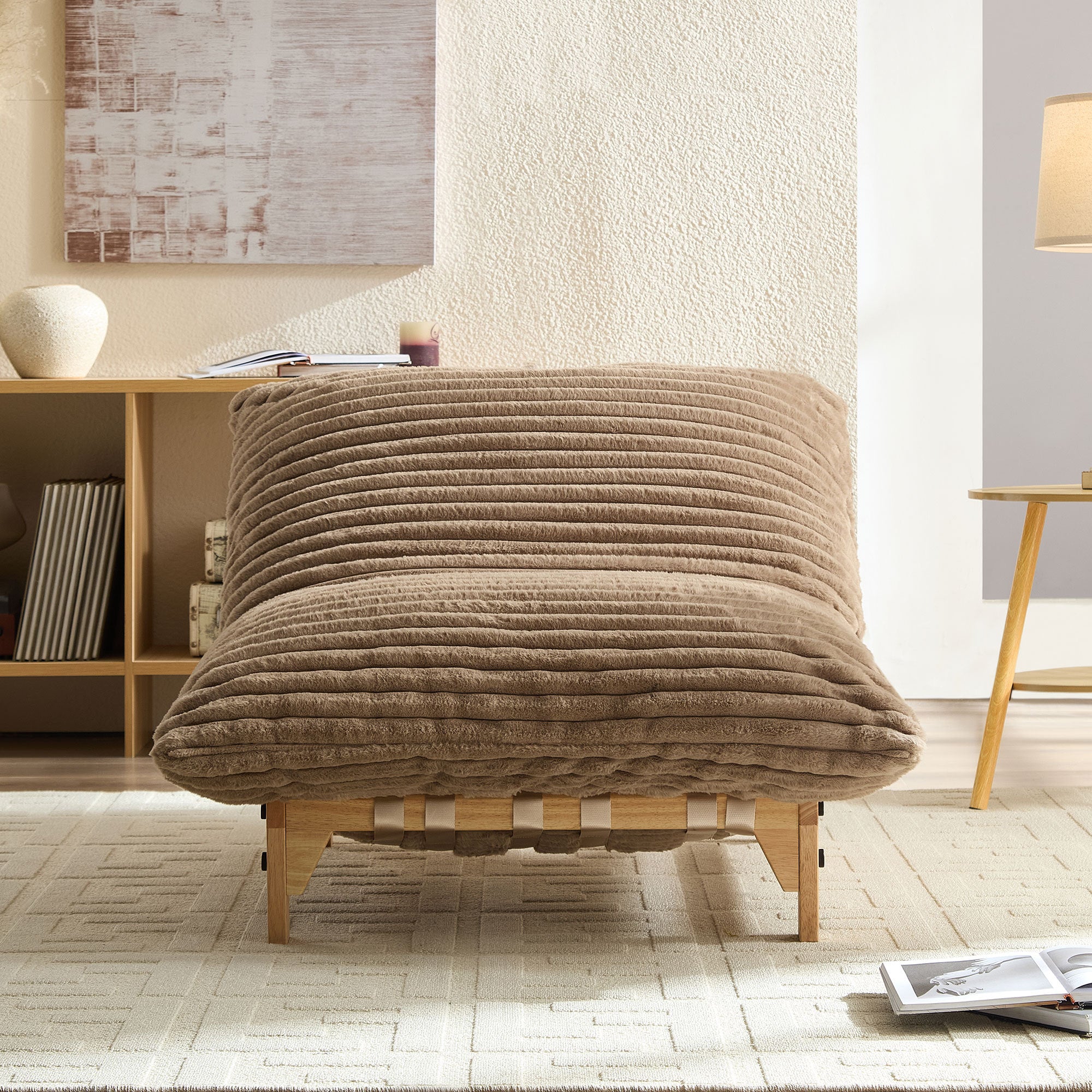 Front-facing corduroy sofa chair in a modern living room, showcasing its plush texture and ergonomic design.