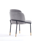 Angled rear view of Modern Dining Chair - Stylish Grey - Durable Metal Base highlighting the supportive back and elegant frame design.
