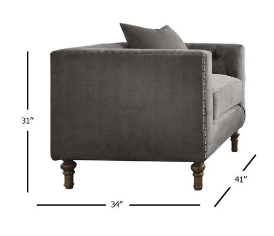 Side view of Sidonia Gray Velvet Chair with Pillow showing dimensions 31x34x41 inches, ideal for stylish and compact seating arrangements.