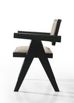 Side profile of Jasper dining chair with angular black wood frame and beige fabric upholstery. Contemporary and ergonomic.