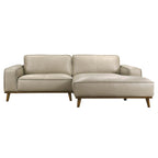 Mid-century modern beige top-grain leather sectional sofa with a right-hand chaise and walnut-finished wood legs.