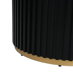 Close-up of fluted black pedestal base with gold trim. Sturdy iron construction enhances the table’s modern aesthetic.