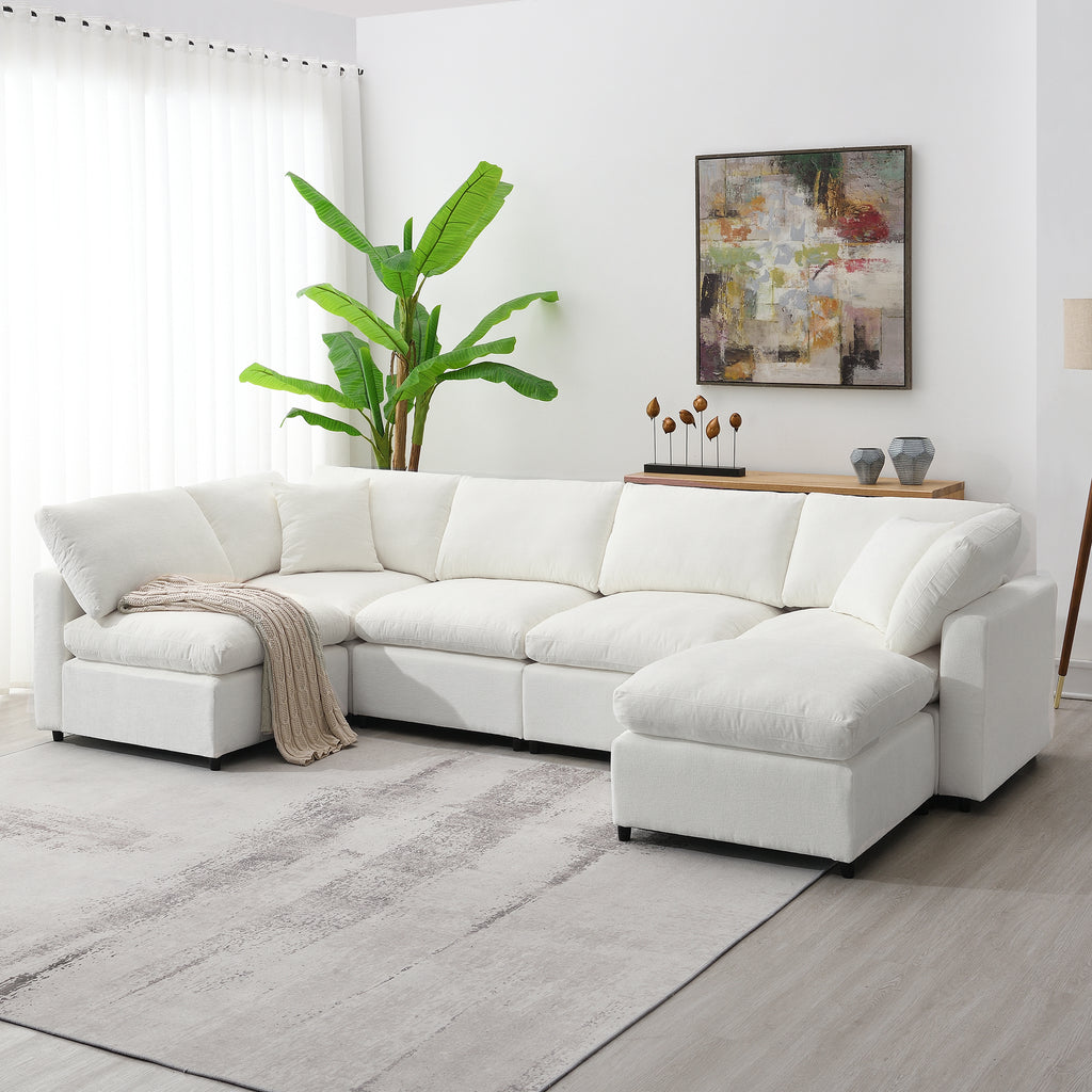 130' Modular Sofa Bed - Convertible 6 Seat Sectional in white chenille fabric, arranged in L-shape with throw blanket in modern living room.