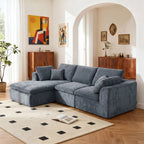 Modern L-shaped sofa with chaise in a cozy living room, upholstered in soft blue chenille with plush cushions and modular design.