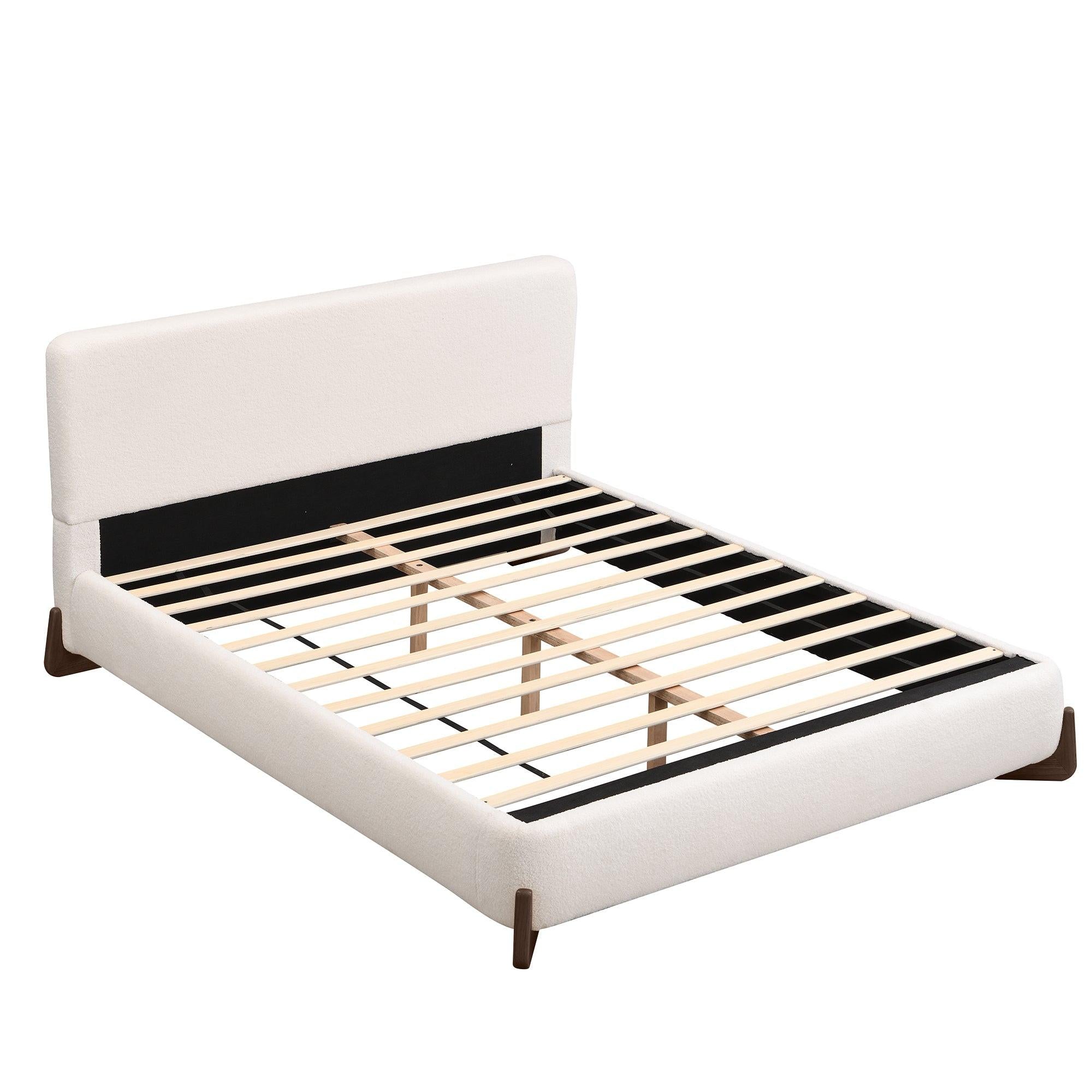 White Upholstered Queen Bed with Solid Wood Legs.