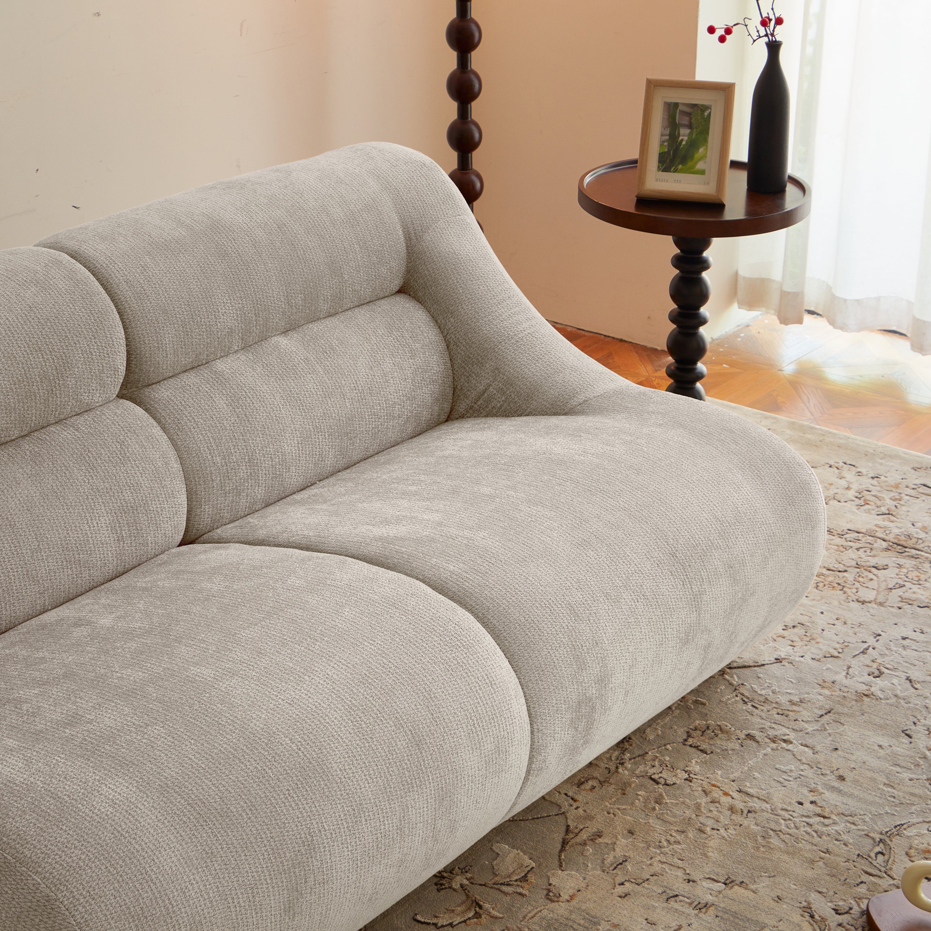 Angled view of beige memory foam 2-seater sofa with soft curves and chenille fabric, perfect for small living rooms and easy mobility.
