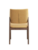 Back view of Sarha Dining Set chair with yellow linen fabric and walnut wood frame, showcasing mid-century design.