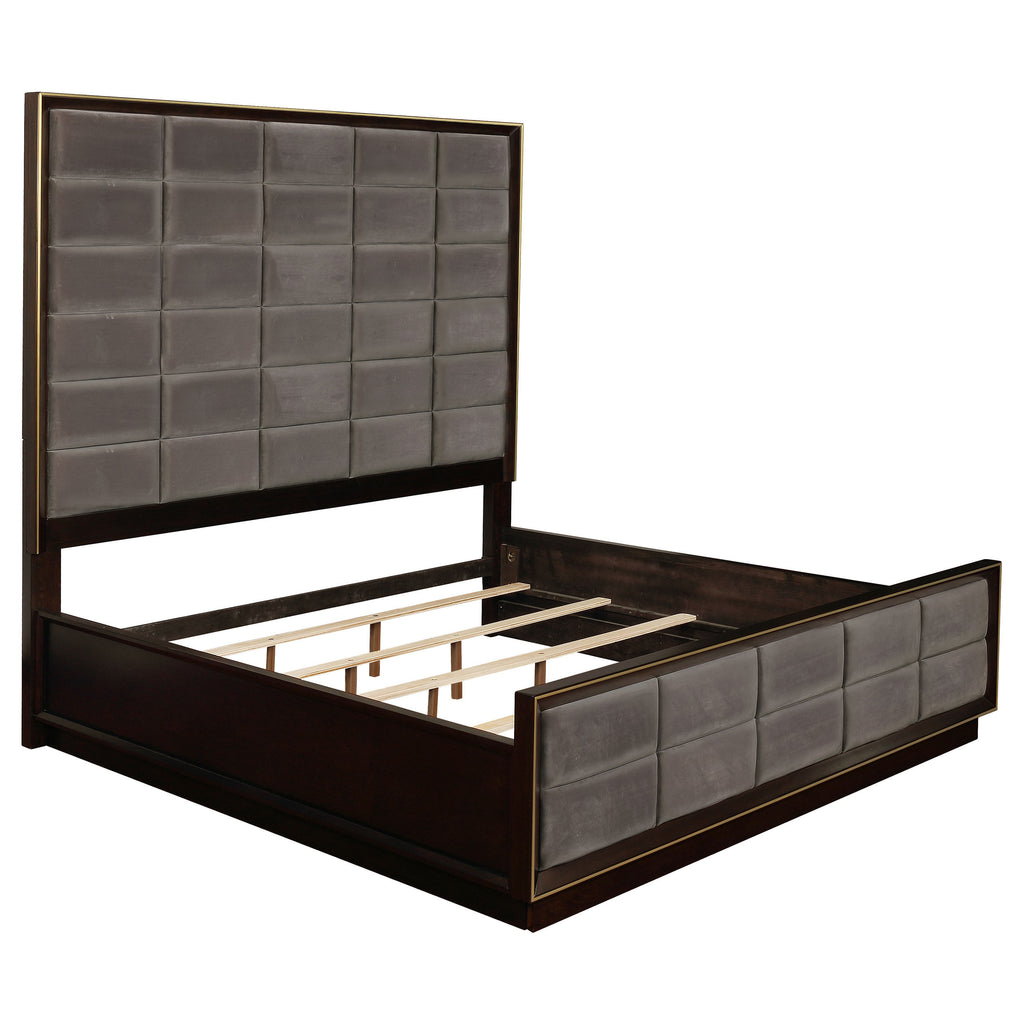 Eastern King panel bed with grey leatherette grid tufting, dark smoked peppercorn frame, and goldtone trim.