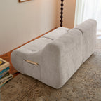Rear angle of compact beige 2-seater memory foam sofa featuring a built-in side pocket and soft chenille fabric for modern interiors.