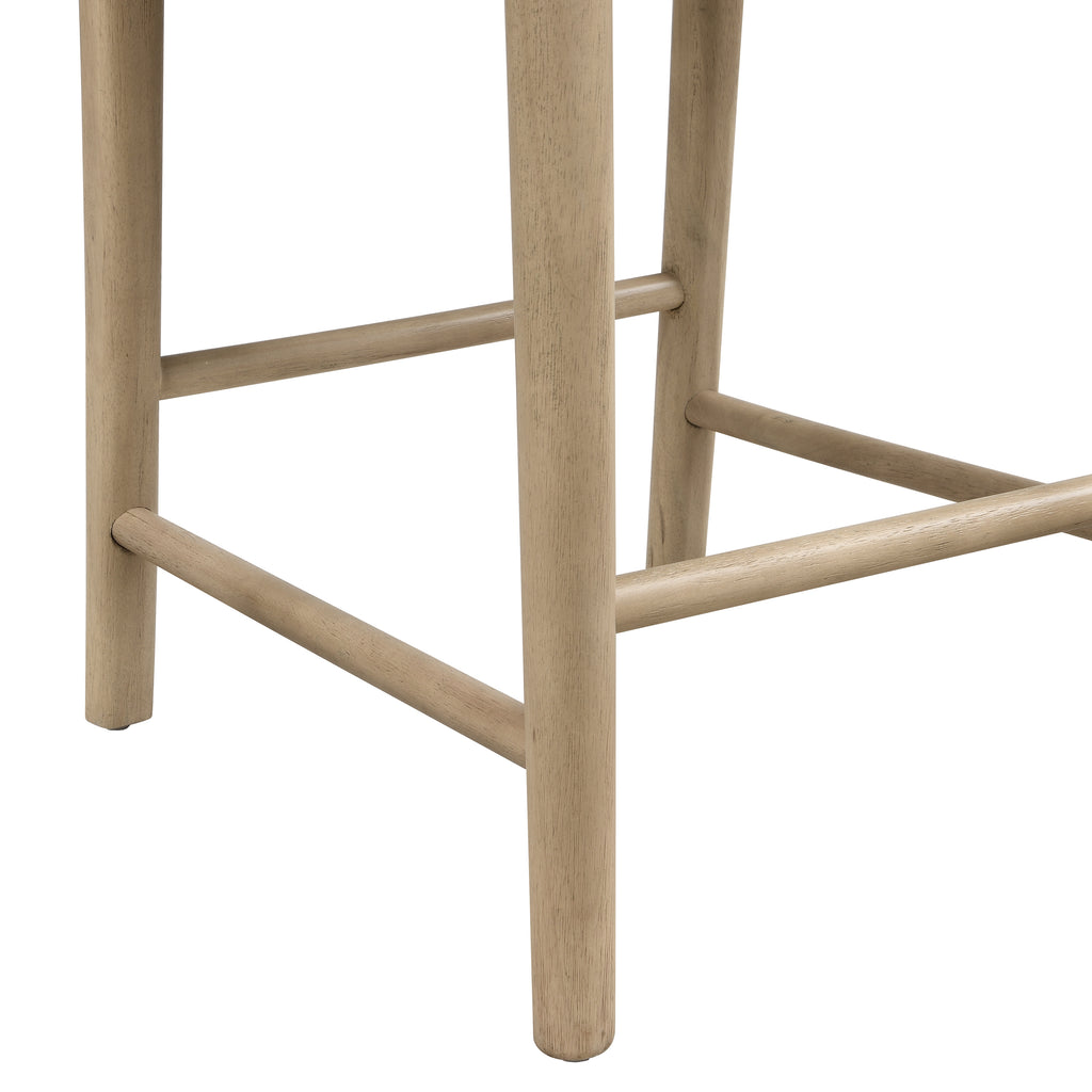 Close-up of stool legs and footrest bar in light wood finish. Built for stability and everyday use in kitchen or bar areas.