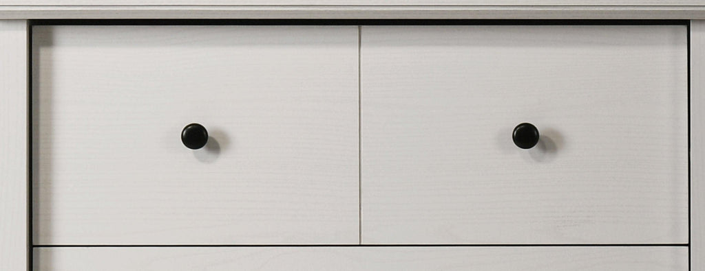 Elara White 4-Drawer Chest with Black Metal Handles.