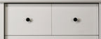 Elara White 4-Drawer Chest with Black Metal Handles.