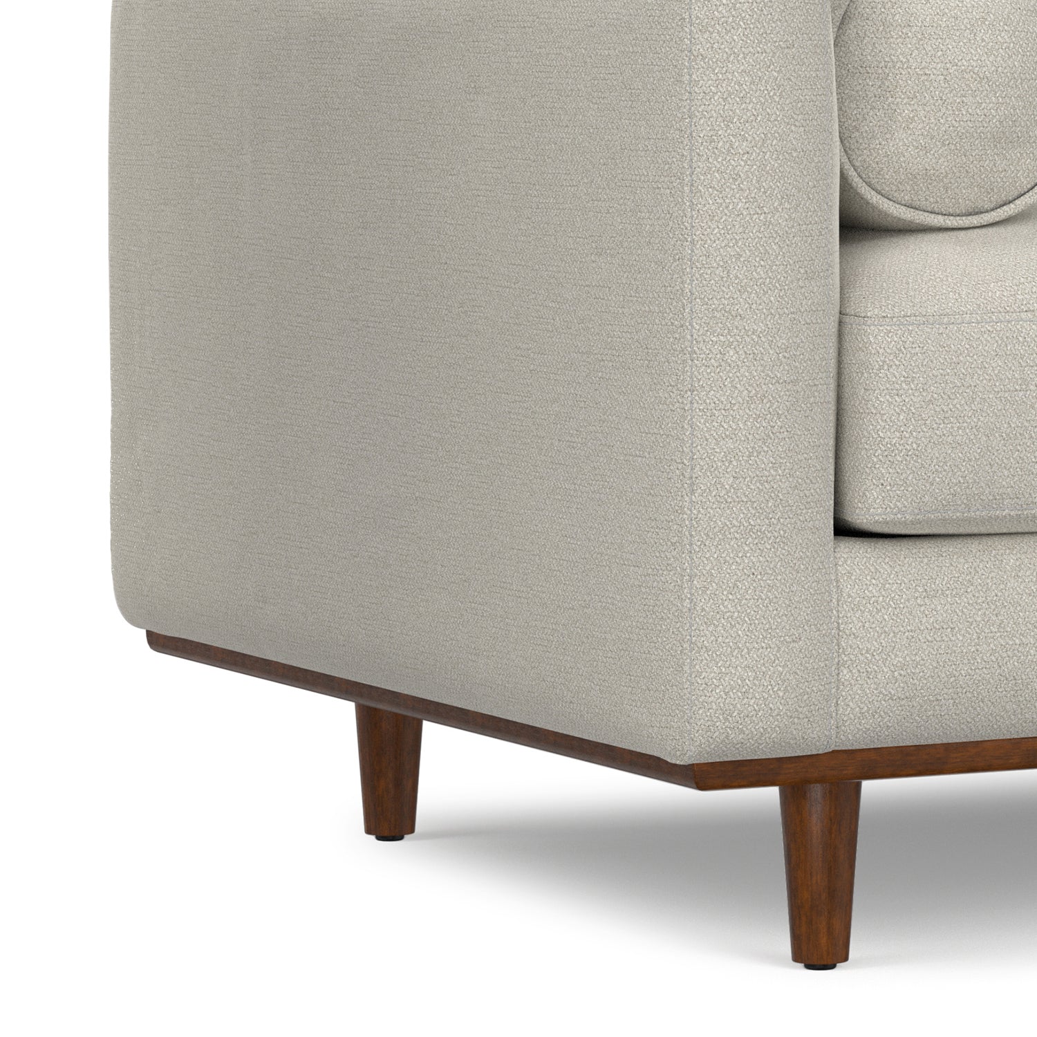 Close-up of wooden leg and lower frame on Modern Armchair Cream White - Morrison Collection, emphasizing mid-century design.