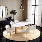 Set of Contemporary Dining Arm Chairs in White and Gold arranged around an oval dining table in a modern dining room.