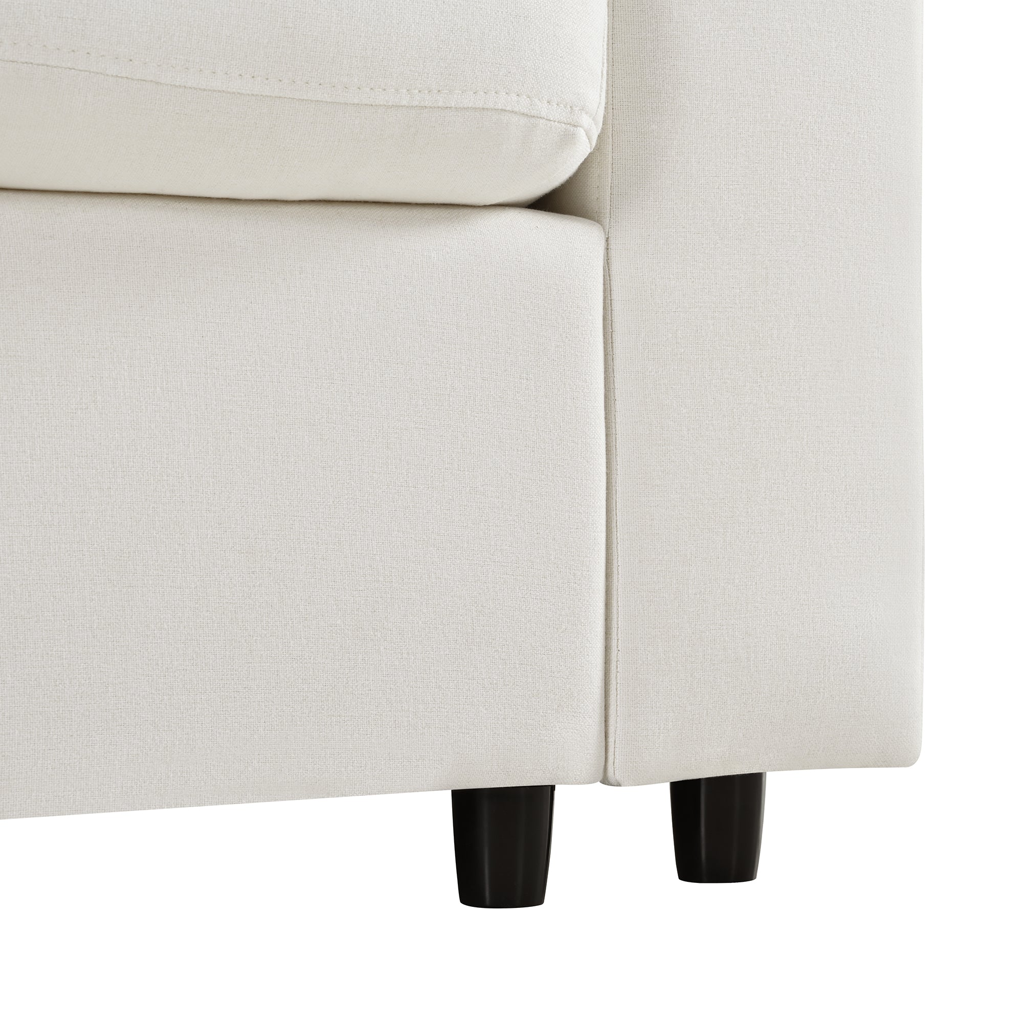 Close-up of the U_STYLE sectional sofa base showing durable chenille upholstery and sturdy black legs for modern living room decor.