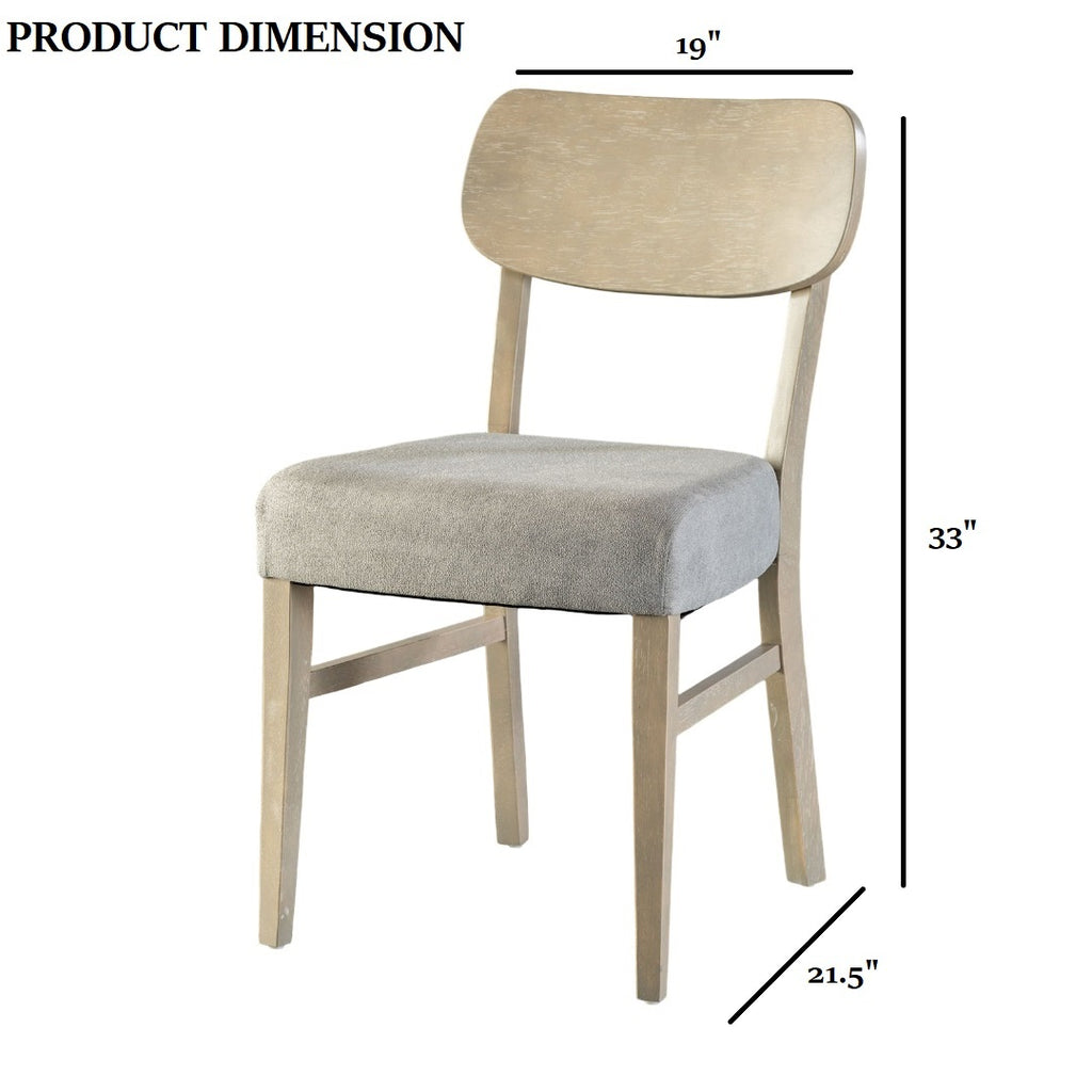 Transitional gray dining chair with dimensions 33"H x 19"W x 21.5"D, featuring padded seat and tapered legs.