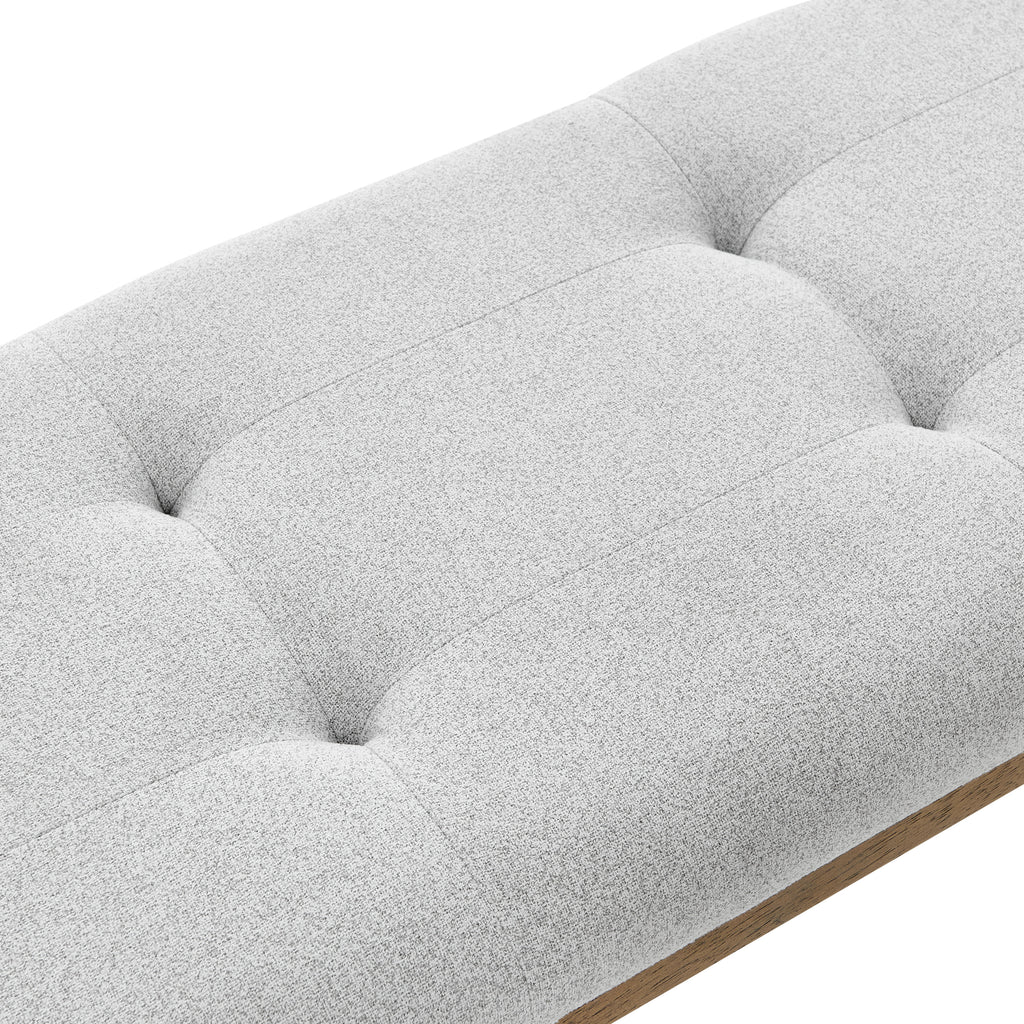 Detail of tufted cushion on Darla Dining Set bench featuring soft light gray fabric and plush padding for cozy seating.