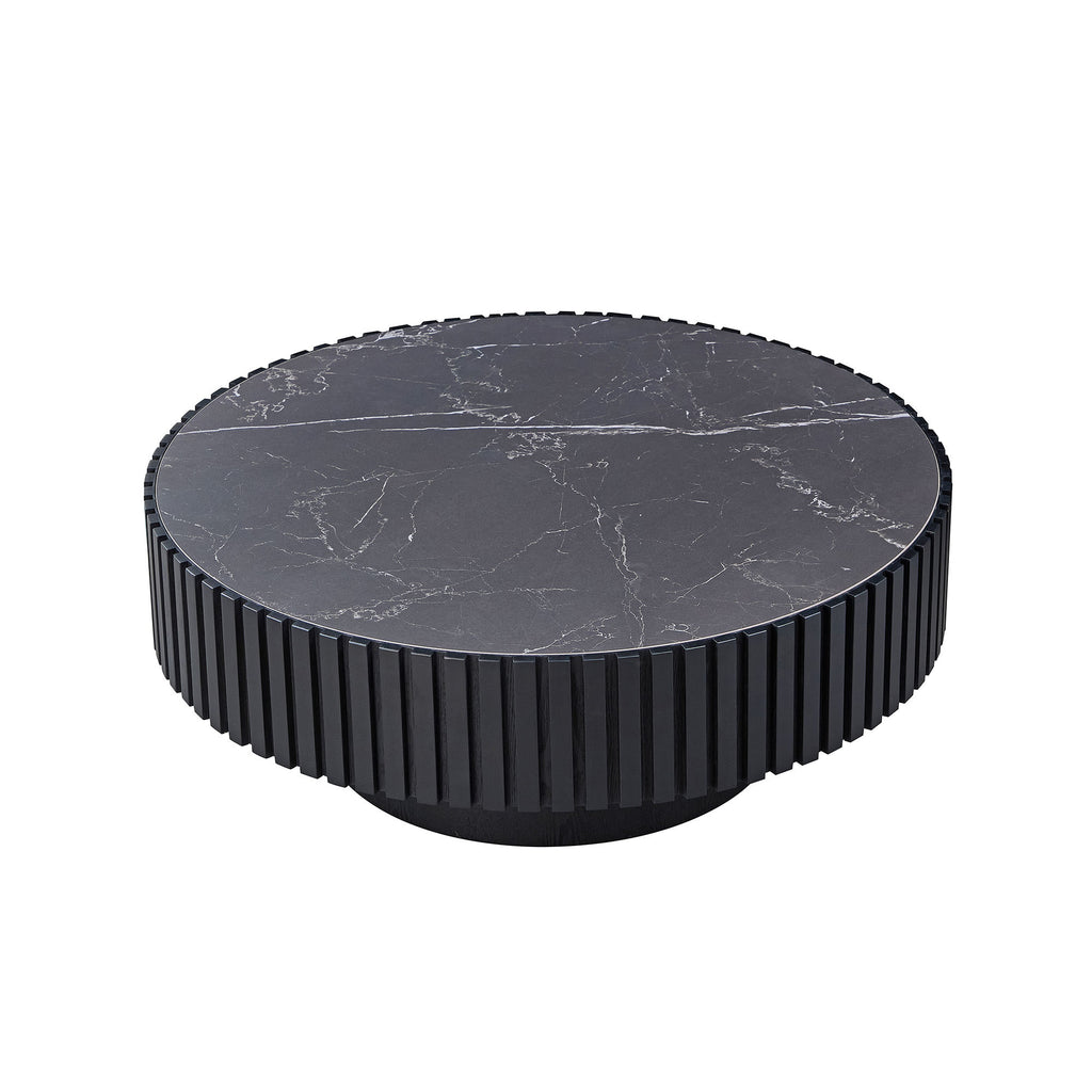 35.43'' sintered stone coffee table in modern black finish featuring a fluted cylindrical base and smooth round top.