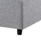 Leg and corner base of 130' U-Shaped Sectional Sofa, featuring sturdy black legs and tightly woven gray chenille fabric.