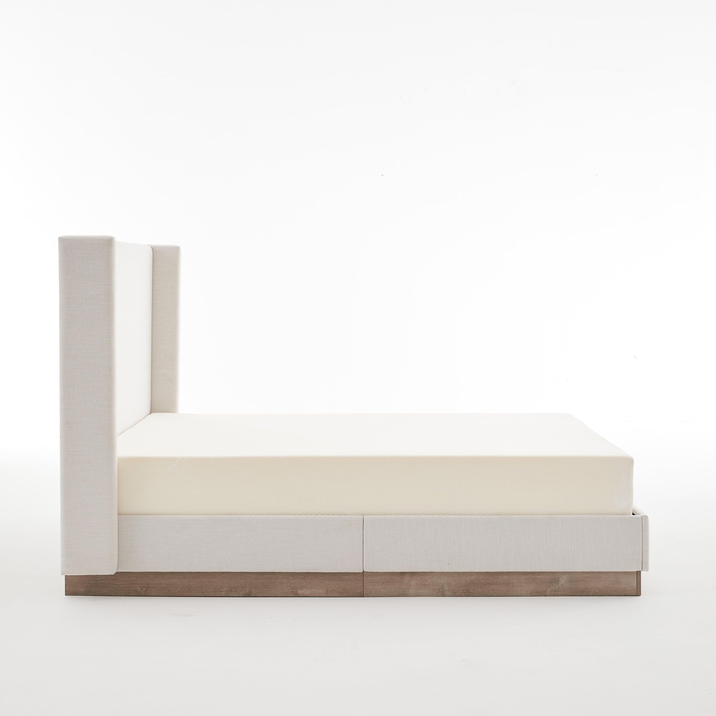 Hosford Minimalist Upholstered Wingback Bed.