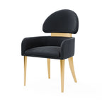 Single black dining arm chair in contemporary style featuring curved backrest and matte gold legs, ideal for modern dining rooms.