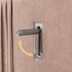 Close-up of adjustable reading light on upholstered headboard of queen bed, ideal for nighttime reading convenience.